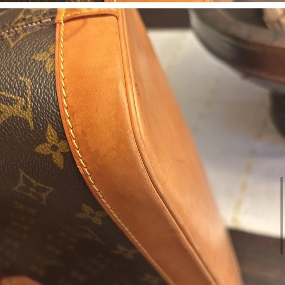 Louis Vuitton AlmaMonogram Handbag